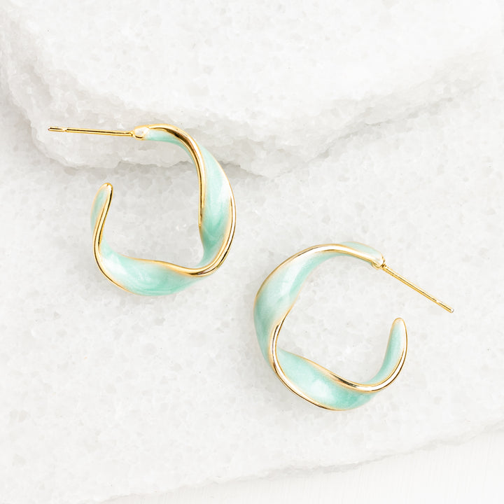 A pari of gold rimmed hoop earrings with mint green, gold plated hoops for women, women's gold hoops, fair trade gifting business