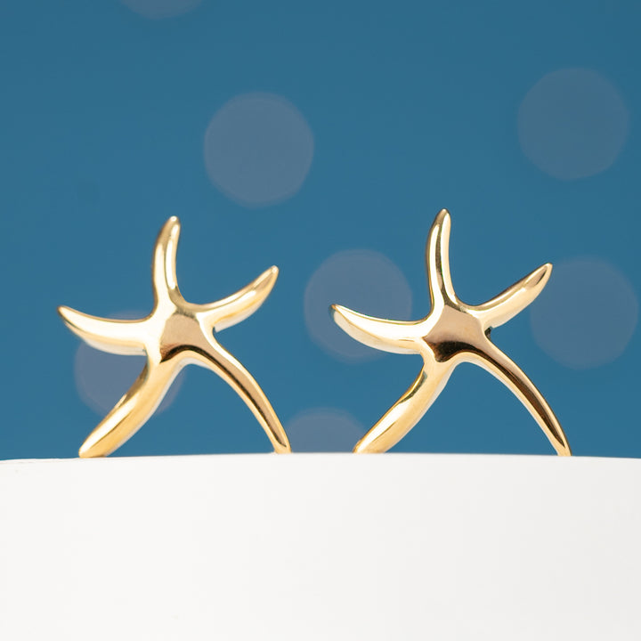 Gold starfish shaped studs, sustainable fair trade jewellery, gift shops near me, cute stud earrings  for women