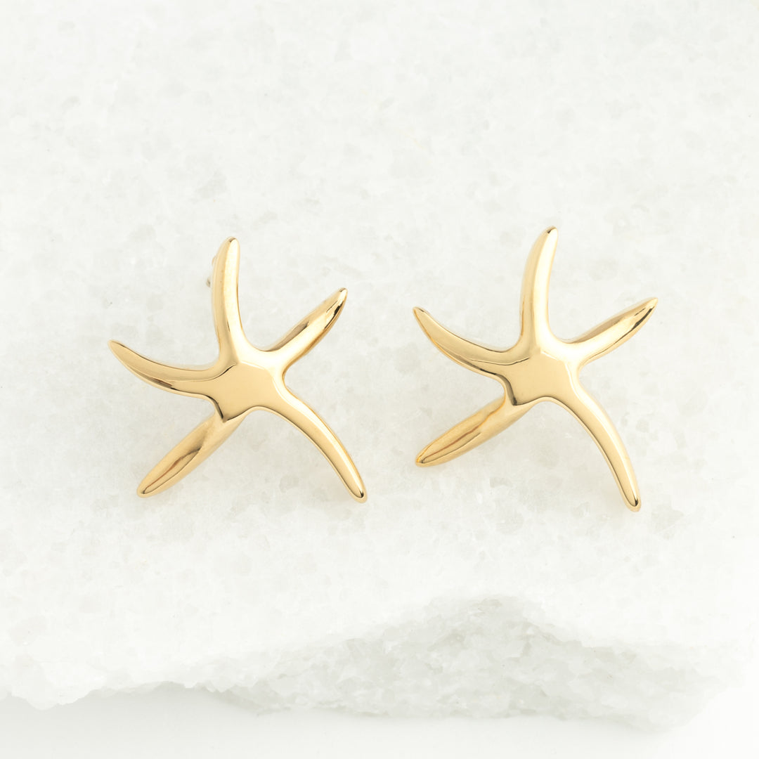 A pair of gold plated starfish shaped studs, beach jewellery, ocean earrings, gold studs for women, best xmas presents