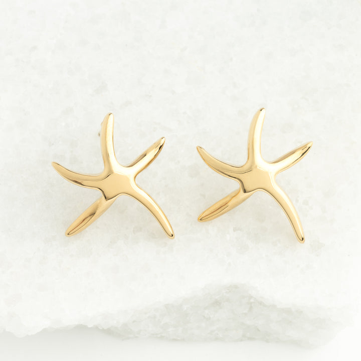A pair of gold plated starfish shaped studs, beach jewellery, ocean earrings, gold studs for women, best xmas presents