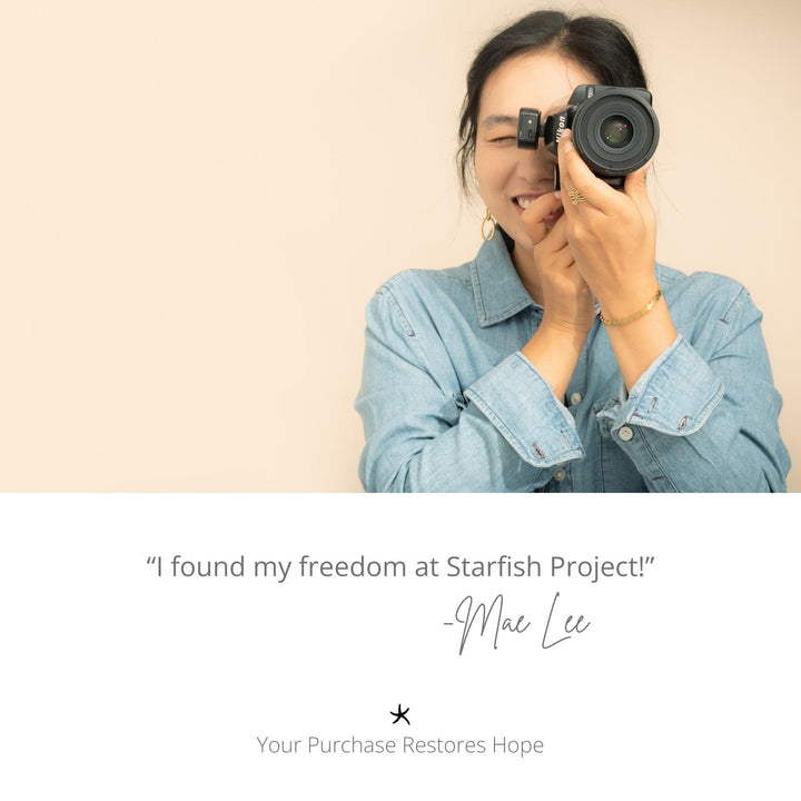 Photo of female photographer wearing beautiful gold bracelet, gold earring, and gold ring, symbolism for hope, Starfish Project, jewellery company