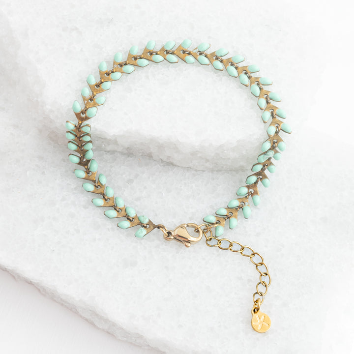 Gold plated bracelet with seafoam green seed shapes, mint green bracelet, gold and green bracelet, women's fair trade jewellery business