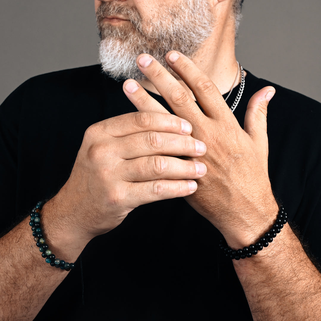 Man wearing beaded bracelets, men's bracelets, freedom company near me, jewellery website for men