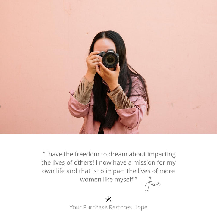 Photo of a photographer, woman holding a camera, symbol of starfish, career development, handcrafted jewellery, quality jewellery