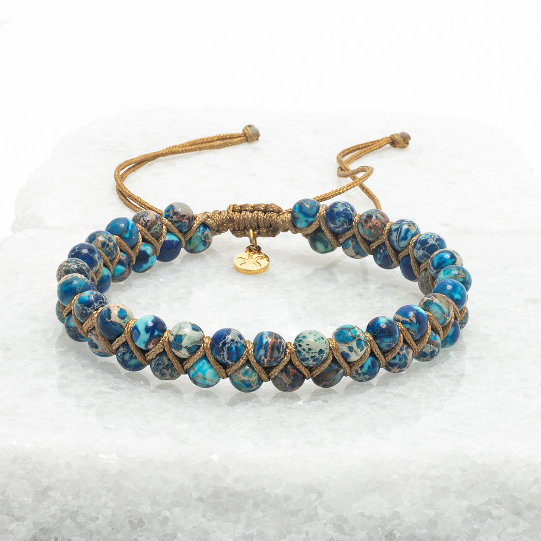 Blue beaded bracelet with gold accents, gold shaded bracelet, beautiful bracelets for women, sustainable fair trade jewellery company